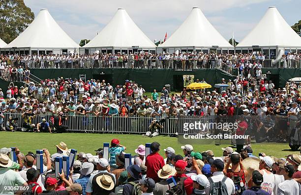 Tiger Woods of the USA tees off on the1st hole during the final round of the 2009 Australian Masters at Kingston Heath Golf Club on November 15, 2009...