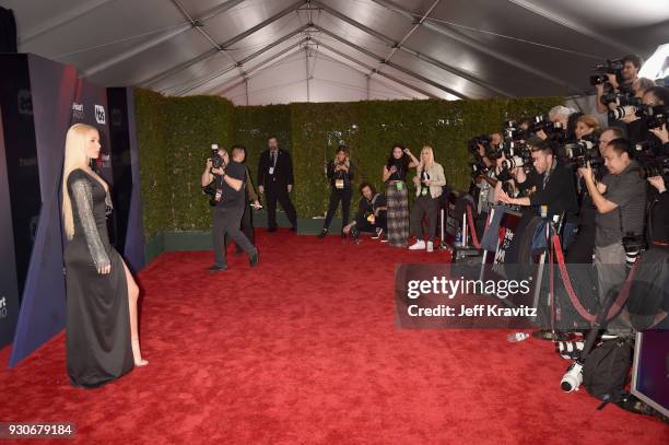 Iggy Azalea arrives at the 2018 iHeartRadio Music Awards which broadcasted live on TBS, TNT, and truTV at The Forum on March 11, 2018 in Inglewood,...