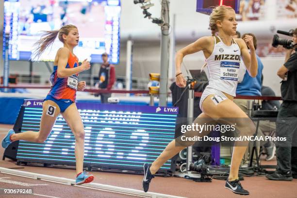 University of Missouri's Karissa Schweizer begins to make a move with Allie Ostrander of Boise State in chase in the Womens 3000 Meter Run during the...