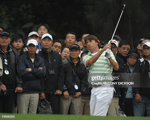 Robert-Jan Derksen of the Netherlands plays a shot during the final round of the Hong Kong Open golf tournament at the Hong Kong Golf Club in Fanling...