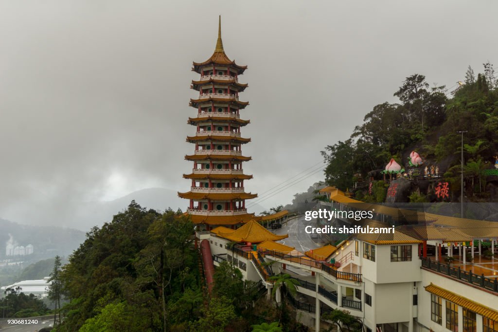 The Chin Swee Caves Temple over clouds and heavy fog. The temple is situated in the most scenic site of Genting Highlands, Malaysia. Within the Temple is seated a statue of Qingshui, a Buddhist monk who has long been referred to as a deity.