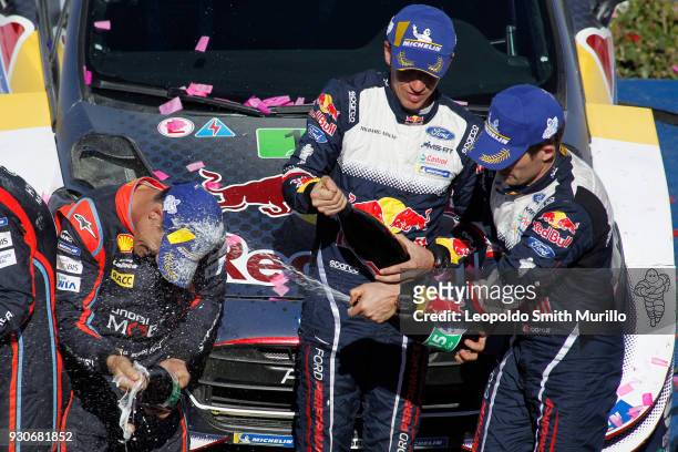 Dani Sordo of Spain , Julien Ingrassia and Sebastien Ogier of France celebrate the first position during the FIA World Rally Championship Mexico 2018...