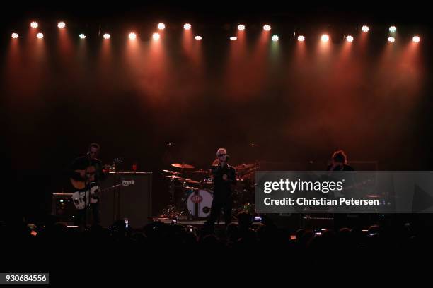 Singer Jeff Gutt , guitarist Dean DeLeo , bass player Robert DeLeo and drummer Eric Kretz of Stone Temple Pilots perform at Marquee Theatre on March...