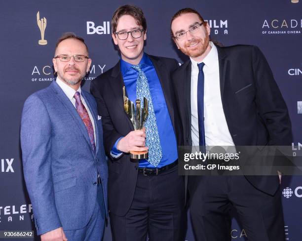 Bernard Gariepy Strobl, Daniel Bisson and Louis-Antoine Lassonde pose in the press room at the 2018 Canadian Screen Awards at Sony Centre for the...