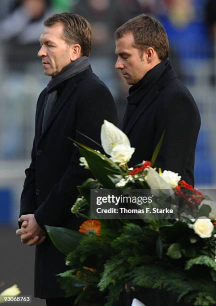 Andreas Koepke and Hans-Dieter Flick attend the memorial service prior to Robert Enke's funeral at AWD Arena on November 15, 2009 in Hanover,...