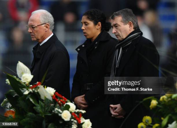 Franz Beckenbauer, Steffi Jones and Wolfgang Niersbach attend the memorial service prior to Robert Enke's funeral at AWD Arena on November 15, 2009...