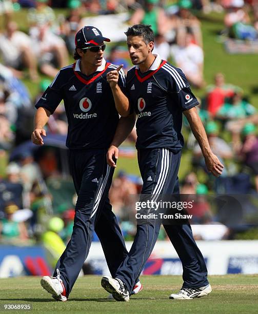 England captain Alastair Cook has a chat with Sajid Mahmood of England during the Twenty20 International match between South Africa and England at...
