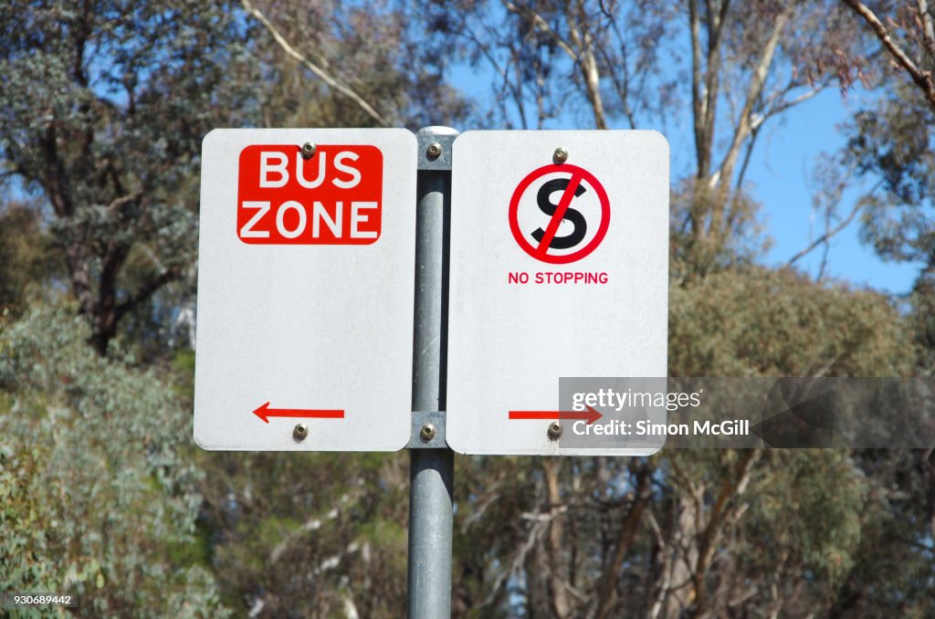 Bus Zone and No Stopping signs