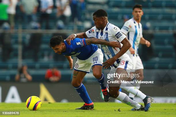 Walter Montoya of Cruz Azul struggles for the ball against Oscar Murillo of Pachuca during the 11th round match between Cruz Azul and Pachuca as part...