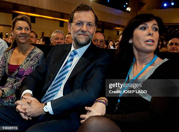 The leader of the opposition Spanish Popular Party Mariano Rajoy sits next to the general secretary of the PP, Maria Dolores Cospedal , and the...