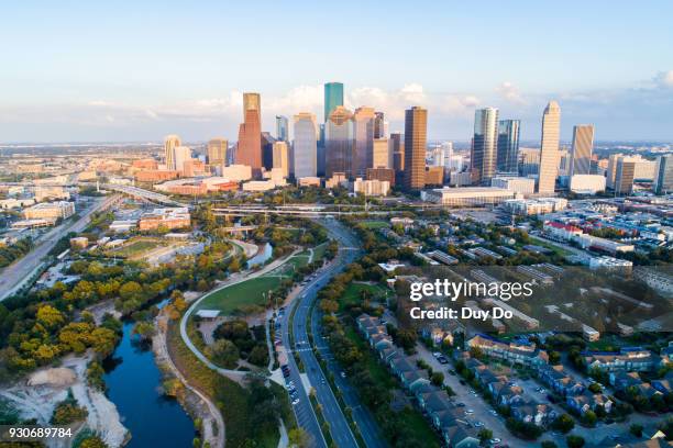 aerial view taking by drone of downtown houston, texas - downtown houston stock pictures, royalty-free photos & images