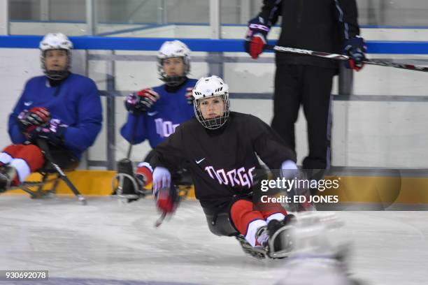 In a photo taken on March 11 Paralympic ice hockey player Lena Schroeder of Norway attends a training session at the Gangneung Hockey Centre in...