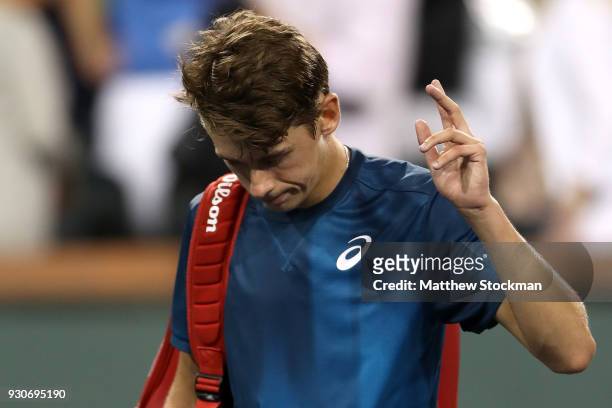 Alex De Minaur of Australia leaves the court after losing to Juan Martin Del Potro of Argentina during the BNP Paribas Open at the Indian Wells...