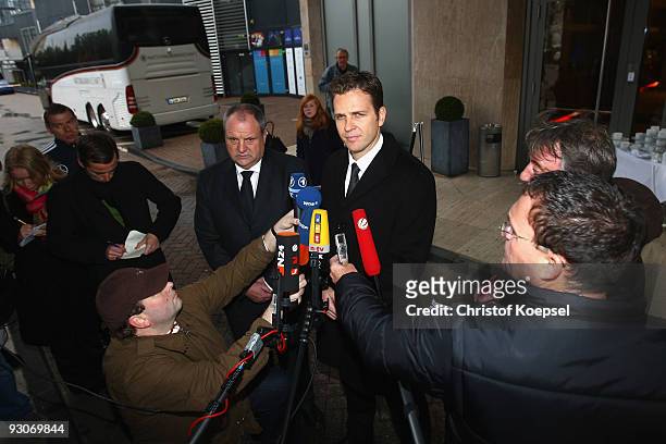 Manager Oliver Bierhoff and press speaker Harald Stenger speak to the media after the arrival of the German National Team at the Hilton Hotel on...