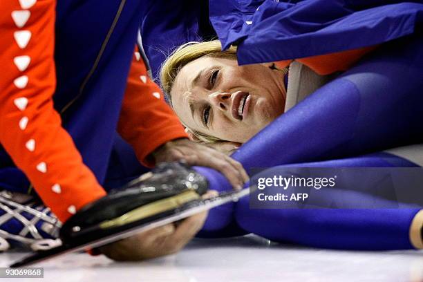 Dutch Marianne Timmer grimaces after she fell during her 500 meter race at the ISU World Cup speedskating in Heerenveen, on November 13, 2009. Dutch...