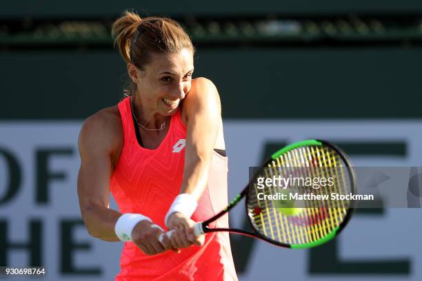 Petra Martic of Croatia plays Jelena Ostapenko of Latvia during the BNP Paribas Open at the Indian Wells Tennis Garden on March 11, 2018 in Indian...