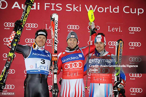 Reinfried Herbst from Austria takes 1st place, Ivica Kostelic from Croatia takes 2nd place and Jean-Baptiste Grange from France takes 3rd place...