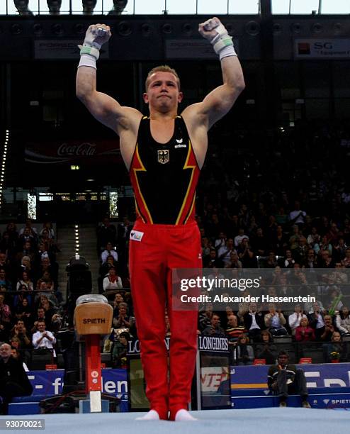 Fabian Hambuechen of Germany reacts after competing at the rings during the Champions Trophy 2009 at the Porsche Arena on November 15, 2009 in...