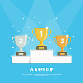 Podium winners. Gold, silver and bronze cups on podium. Vector illustration in flat style.