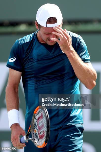 Tennys Sandgren reacts to a lost point while playing David Ferrer of Spain during the BNP Paribas Open at the Indian Wells Tennis Garden on March 11,...