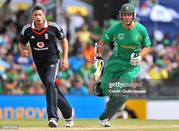 Graeme Smith captain of South Africa runs past Sajid Mahmood of England during the 2nd Twenty20 international match between South Africa and England...