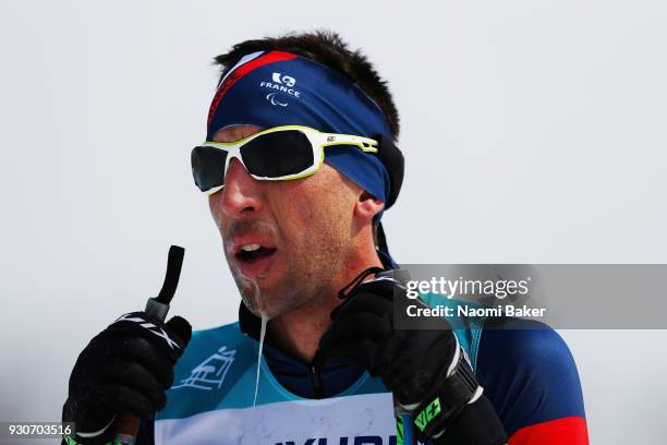 Thomas Clarion of France looks on in the finish area after winning the Bronze Medal during the Men's 20km Free, Visually Impaired during day three of...