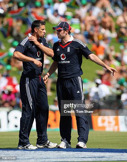 James Anderson of England has a chat with team mate Sajid Mahmood during the Twenty20 International match between South Africa and England at...