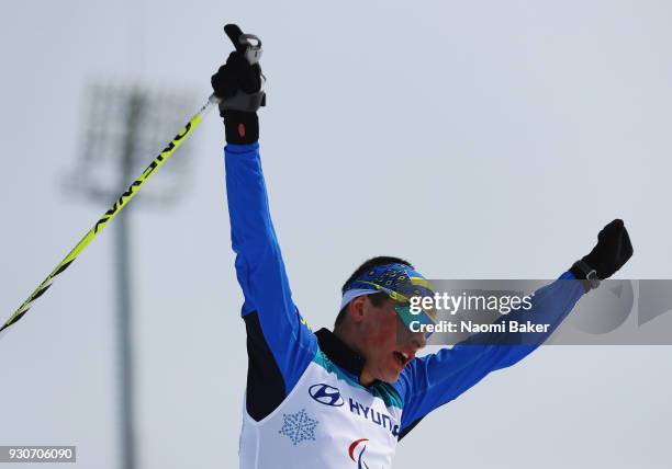 Ihor Reptyukh of Ukraine celebrates after winning the Gold Medal for the Men's 20km free, standing cross-country during day three of the PyeongChang...