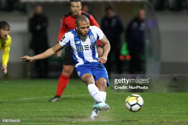 Porto's Algerian forward Yacine Brahimi scores a penalty kick during the Premier League 2017/18 match between Pacos Ferreira and FC Porto, at Mata...