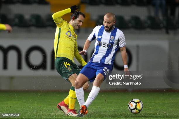 Porto's Portuguese midfielder Andre Andre vies with Pacos Ferreira's midfielder Ruben Micael during the Premier League 2017/18 match between Pacos...