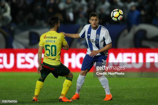 Porto's Portuguese defender Diogo Dalot in action with Pacos Ferreira's Portuguese forward Xavier during the Premier League 2017/18 match between...