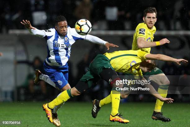 Porto's Portuguese forward Hernani vies with Pacos Ferreira's Portuguese defender Filipe Ferreira during the Premier League 2017/18 match between...