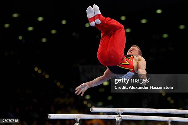 Fabian Hambuechen of Germany competes at the parallel bars during the Champions Trophy 2009 at the Porsche Arena on November 15, 2009 in Stuttgart,...