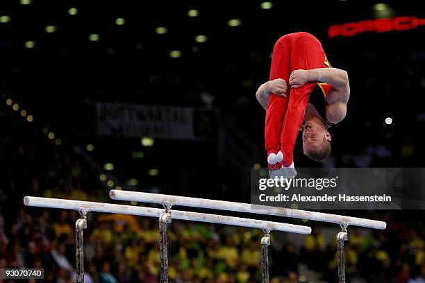 Fabian Hambuechen of Germany competes at the parallel bars during the Champions Trophy 2009 at the Porsche Arena on November 15, 2009 in Stuttgart,...