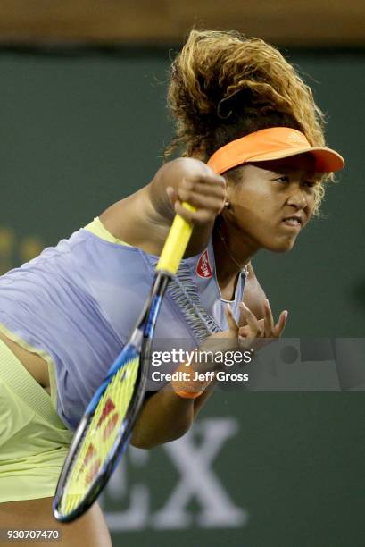 Naomi Osaka of Japan serves to Sachia Vickery during the BNP Paribas Open on March 11, 2018 at the Indian Wells Tennis Garden in Indian Wells,...