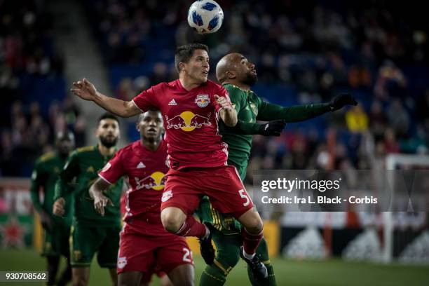 Samuel Armenteros of Portland Timbers and Connor Lade of New York Red Bulls go up for a header during the MLS match between New York Red Bulls and...