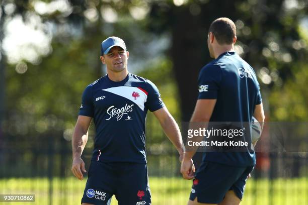 Cooper Cronk and Boyd Cordner speak during a Sydney Roosters Training Session at Kippax Oval on March 12, 2018 in Sydney, Australia.
