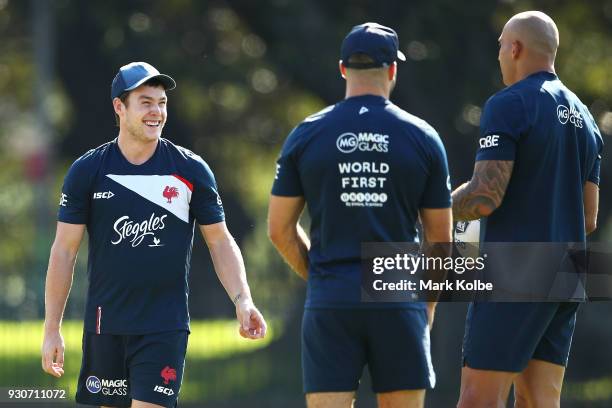 Luke Keary shares a laugh with a team mate during a Sydney Roosters Training Session at Kippax Oval on March 12, 2018 in Sydney, Australia.