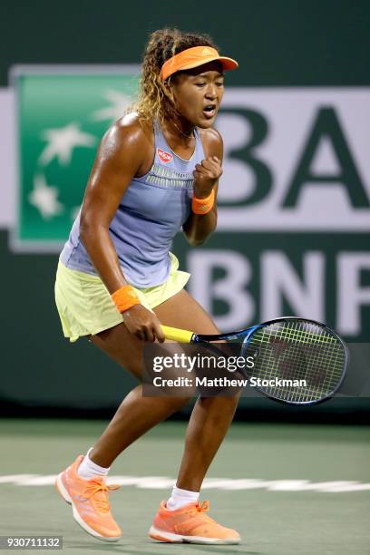 Naomi Osaka of Japan celebrates a point against Sachia Vickery during the BNP Paribas Open at the Indian Wells Tennis Garden on March 11, 2018 in...