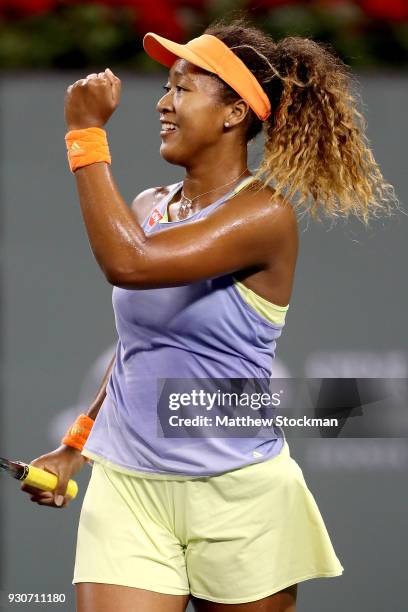 Naomi Osaka of Japan celebrates match point against Sachia Vickery during the BNP Paribas Open at the Indian Wells Tennis Garden on March 11, 2018 in...