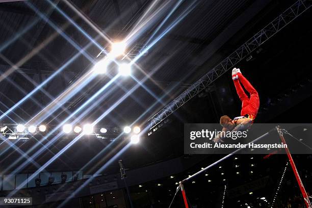 Fabian Hambuechen of Germany competes at the high bar during the Champions Trophy 2009 at the Porsche Arena on November 15, 2009 in Stuttgart,...