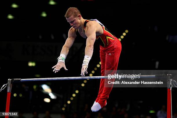 Fabian Hambuechen of Germany competes at the high bar during the Champions Trophy 2009 at the Porsche Arena on November 15, 2009 in Stuttgart,...