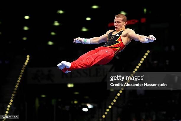 Fabian Hambuechen of Germany competes at the high bar during the Champions Trophy 2009 at the Porsche Arena on November 15, 2009 in Stuttgart,...
