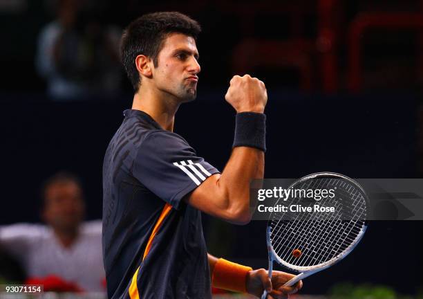 Novak Djokovic of Serbia celebrates a break point during his Final match against Gael Monfils of France during the ATP Masters Series at the Palais...