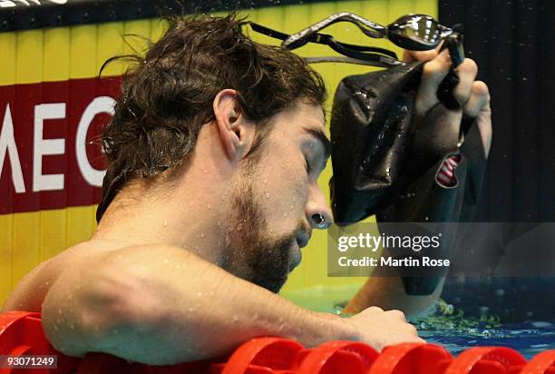 Michael Phelps of USA reacts after the men's 200m individual medley final during day two of the FINA/ARENA Swimming World Cup on November 15, 2009 in...