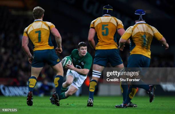 Brian O'Driscoll of Ireland runs at the Australia defence during the Rugby Union International between Ireland and Australia at Croke Park on...