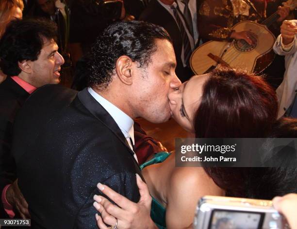 Former MLB player Sammy Sosa and Sonia Sosa kiss while Juan Gabriel sings to them at Sammy Sosa's birthday party at Fontainebleau Miami Beach on...