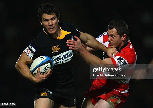 Daniel Leo of Wasps is tackled by Tim Molenaar of Gloucester during the LV Anglo Welsh Cup match between London Wasps and Gloucester at Adams Park on...