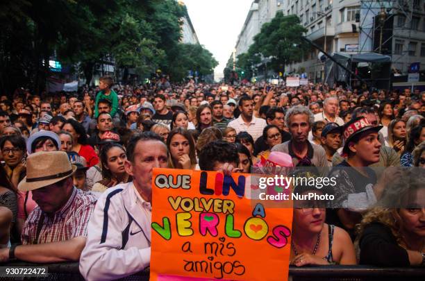 People attend the Show of the band Argentina 'Los Palmeras' in conjunction with the Philharmonic of the province of Santa Fe. The Recital was held in...