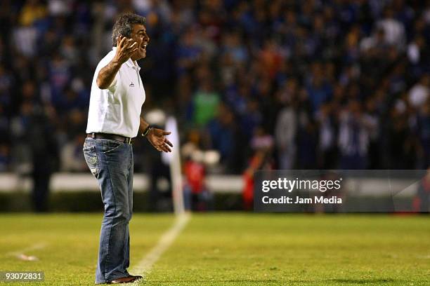 Head coach Carlos Reinoso of Queretaro gestures during their match as part of the 2009 Opening tournament, the closing stage of the Mexican Football...